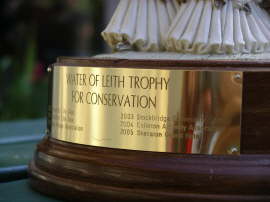 The trophy inscription.